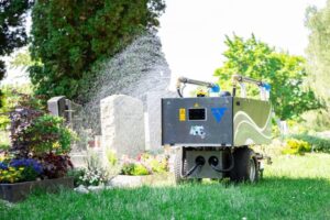 Automated watering of gardens or plots, such as cemeteries, by Rainos. It refills itself and includes an onboard camera providing additional site security (Image: Innok)